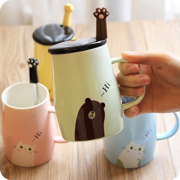 ceramic coffee mug with lid and handle
