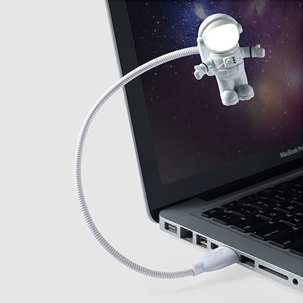 A LED light has an Astronaut shape with a convenient USB plug and bendable cable that lets you aim the LED light where you need it